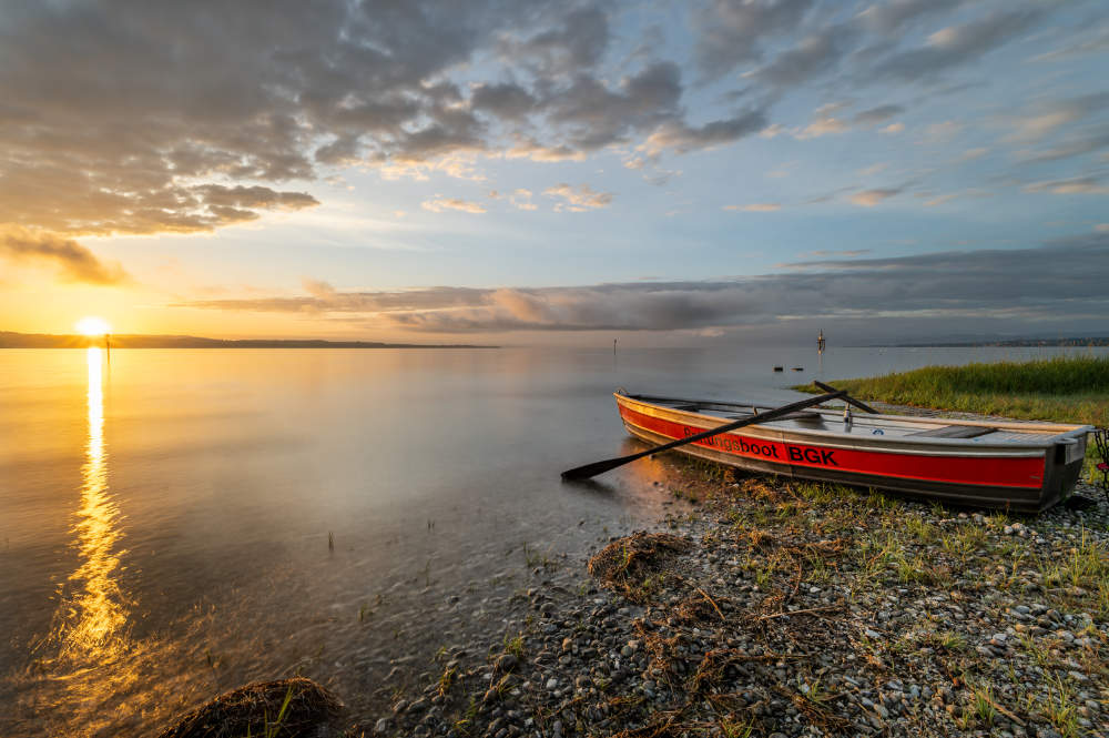 Sonnenaufgang mit Ruderboot